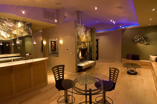 Contemporary rec room with purple LED ceiling lights