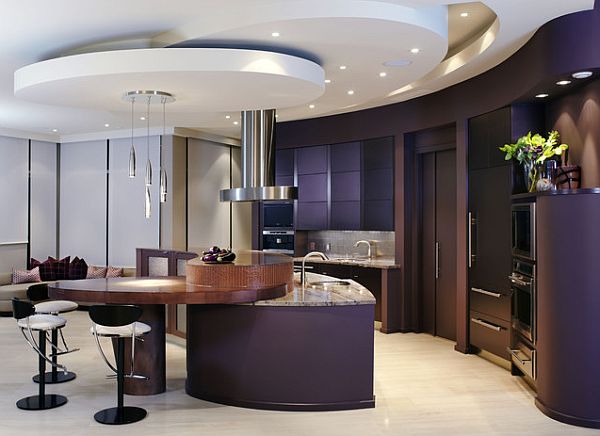 An elegant dark purple kitchen has a certain charm