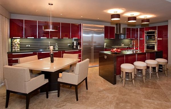 Kitchen with red glass cabinetry