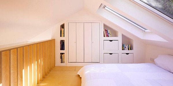 Attic bedroom in a loft with fancy window treatments