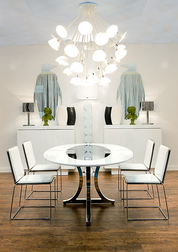 Modern art deco dining room with round table and white chairs