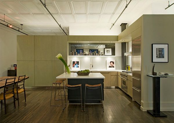 A corner loft kitchen with neutral colors that charm