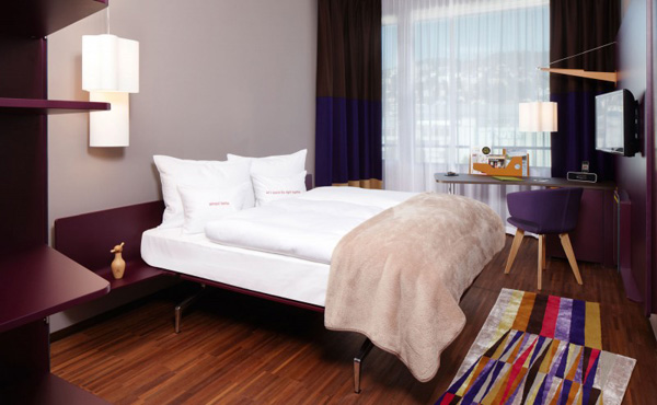 purple themed hotel room