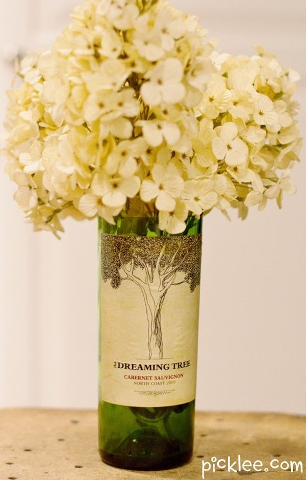 An old wine bottle used as a beautiful vintage vase