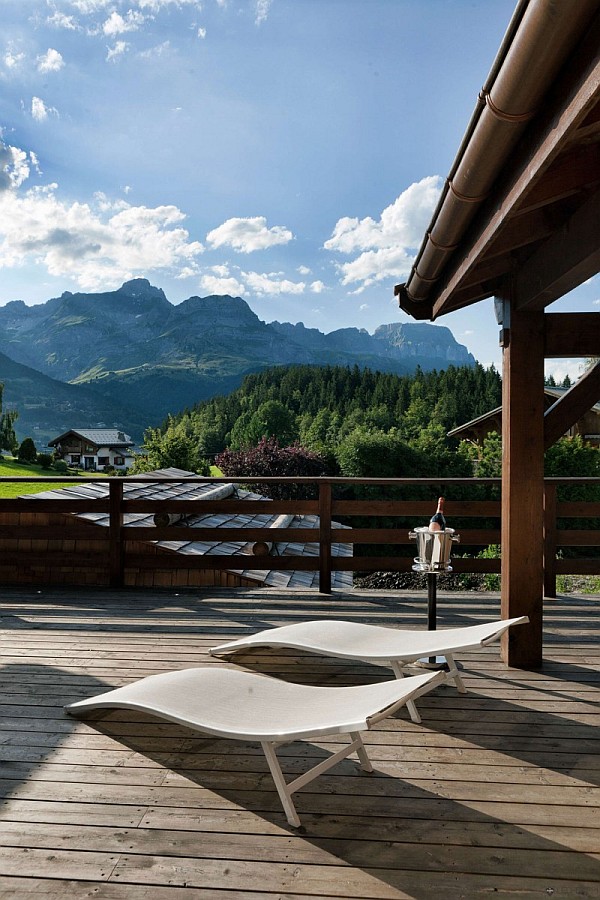 wooden deck with sun loungers