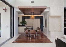 drop ceiling in dark wood above dining table