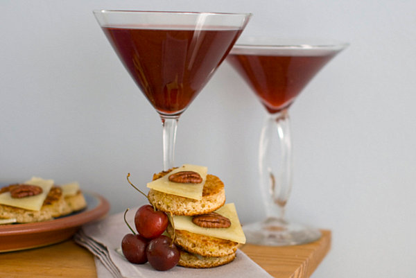 Classic cocktail appetizers of cheese, nuts and fruit