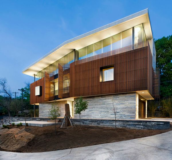 Modern home with exquisite use of wooden shutters