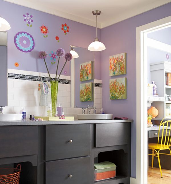 Purple kids' bathroom with ample color and attractive wall art