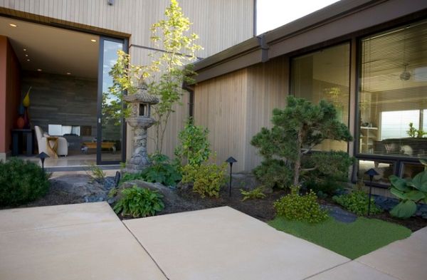 Small and compact Japanese corner garden offers an exquisite and polished appearance