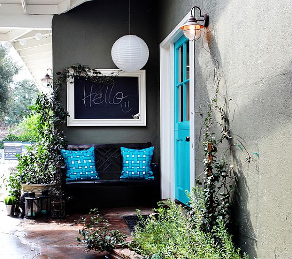 colorful front entry with blue pillows and door