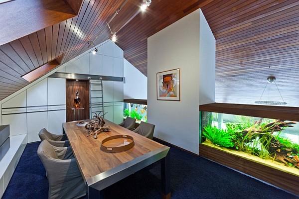 home office with stylish huge aquarium