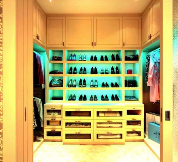 This shoe display serves as a great focal point in this closet. 