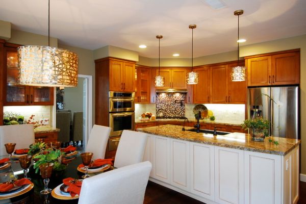 Alita Champagne Pendants over the kitchen island look more like fascinating works of art!