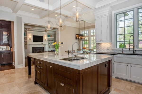 Arteriors Caviar Pendant lights offer a gorgeous textural and visual contrast to this kitchen in Chicago