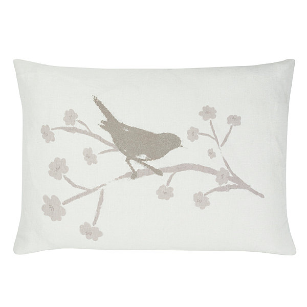 Bird motif cushion