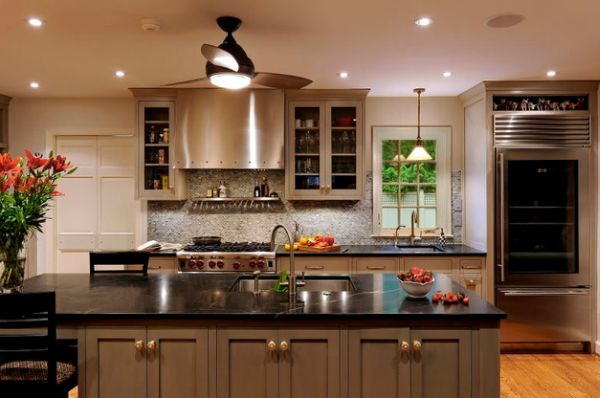 Contemporary family kitchen with a glass door refrigerator in the corner