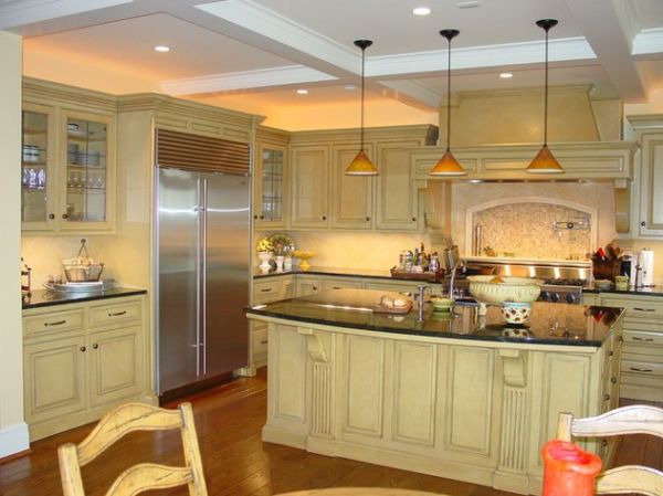 Custom designed kitchen island with pendant lights bring in a classic appeal