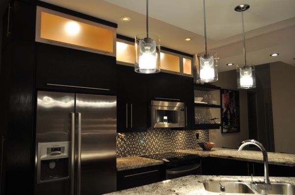 Divine looking pendant lights brighten up this otherwise dark kitchen