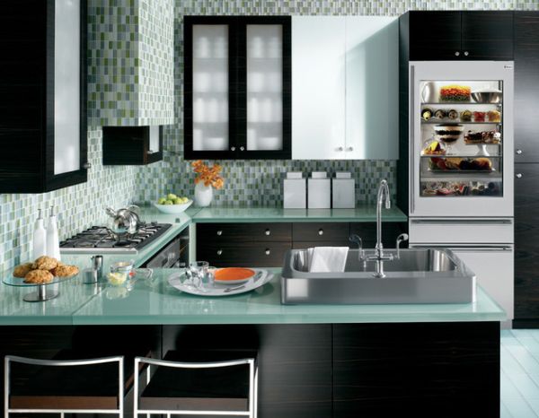 Fabulous kitchen in blue and green with a 30-inch wide integrated glass door refrigerator