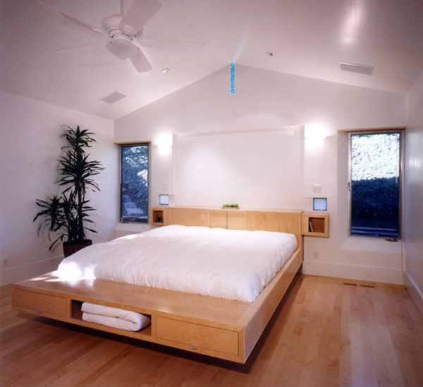 Floating bed design with storage units underneath