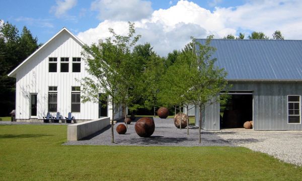 Giant spheres offer a contemporary twist to garden art in a minimalist setting