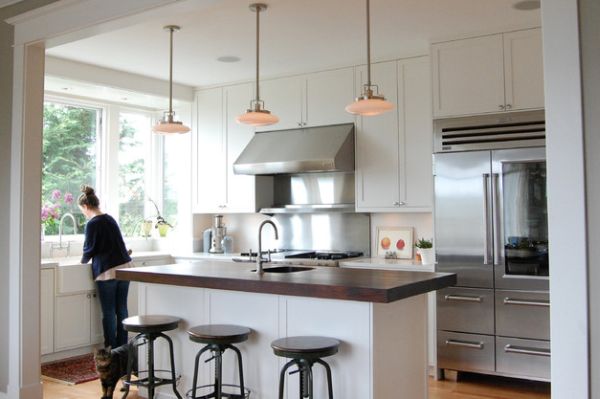 Glass front fridge gives this kitchen a professional look