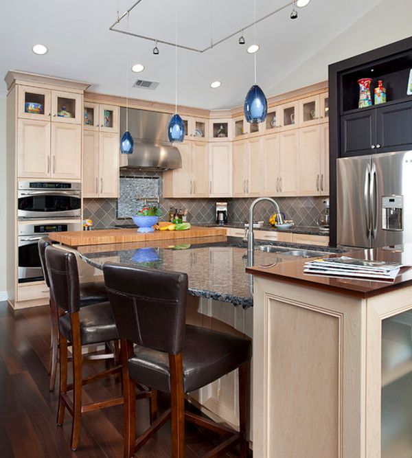 Inner Fire pendant lights in blue brighten up this kitchen space