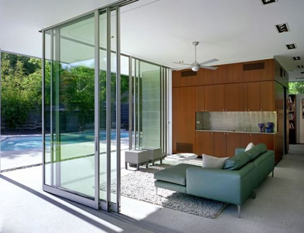 Invite in the outdoors with  stylish sliding glass door walls!