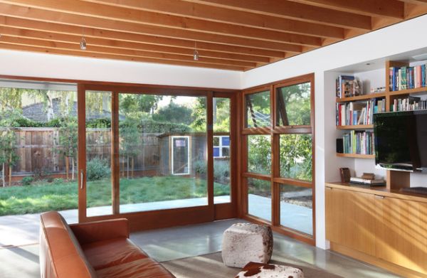 Large sliding glass doors within a wooden frame