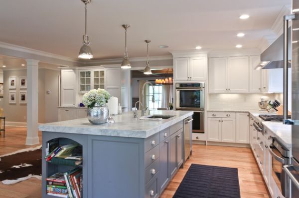 Long kitchen island with marble countertop lit up using Benson pendant lights