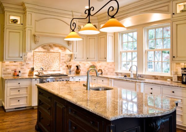 Pendant lights with a traditional touch above a glazed marble kitchen island