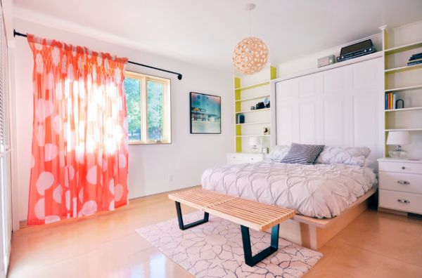 Playful bedroom with Nelson Platform bench and bright orange drapes!