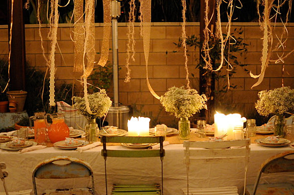 Ribbons hanging over an outdoor table