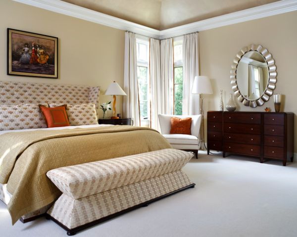 Sleek and stylish bench brings in a whole new shape to this classy bedroom