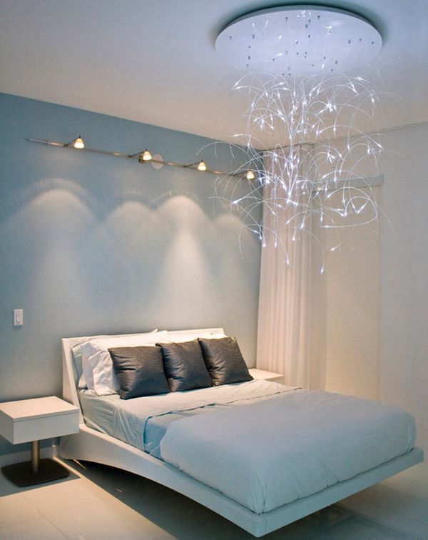 Sleek modern bedroom design with lovely lighting and a floating bed