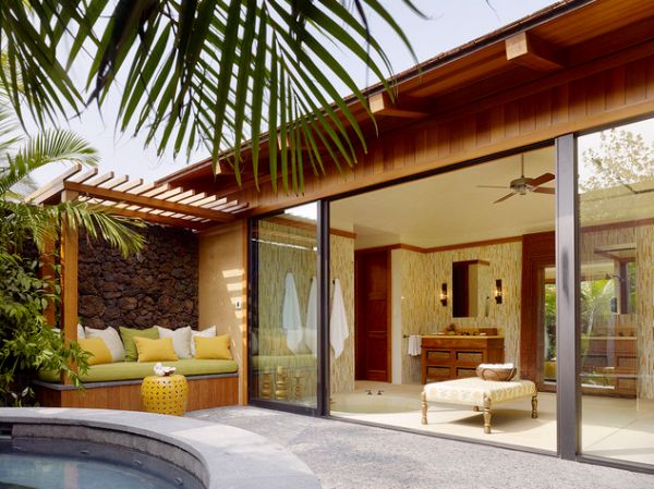 Sliding glass doors open up leading into a stunning and soothing patio