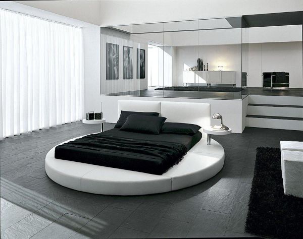 Sophisticated contemporary bedroom with ergonomic round bed at its heart