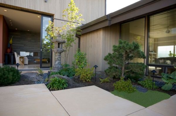 Stylish Asian garden with compact design and a stone lantern at its heart