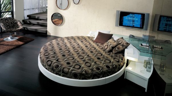 Stylish modern round bed nicely tucked in a corner