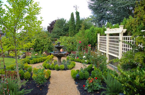 Traditional home garden with multi-level bird bath