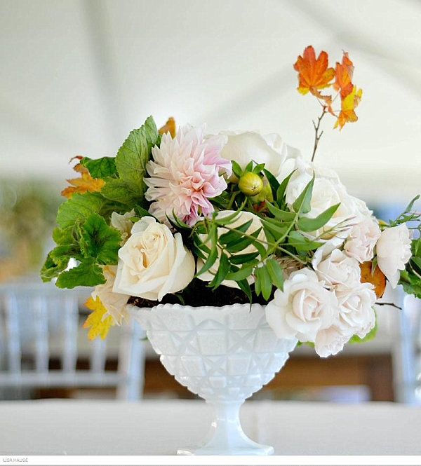 White compote filled with delicate flowers