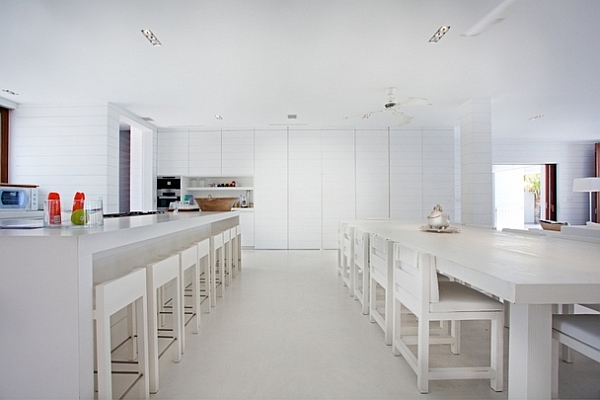 all white kitchen and dining area