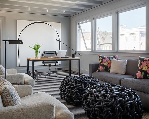 Contemporary home office with beautiful white and green flowers on the desk