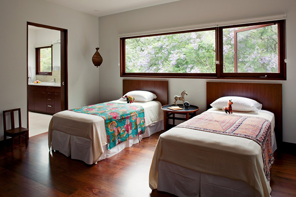 traditional bed in large bedroom