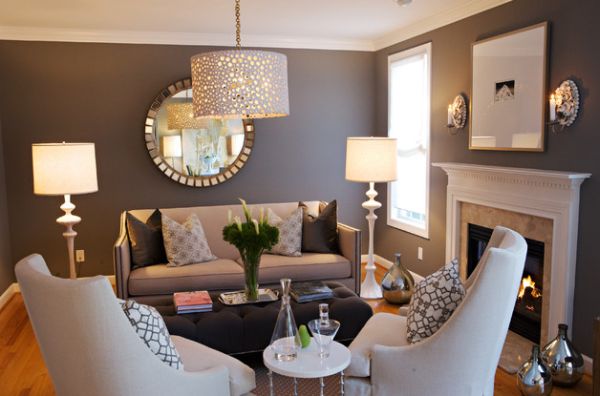 Bright metallic floor vases offer textural contrast in this contemporary living room