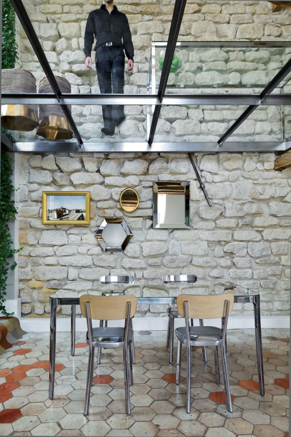 Compact dining area also sports plenty of mirrored surfaces