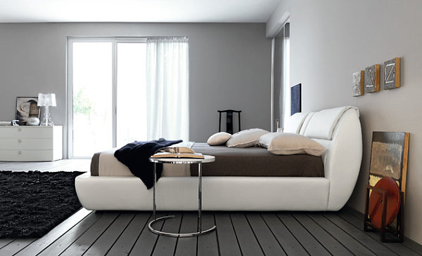 Contemporary bedroom with gray painted floors