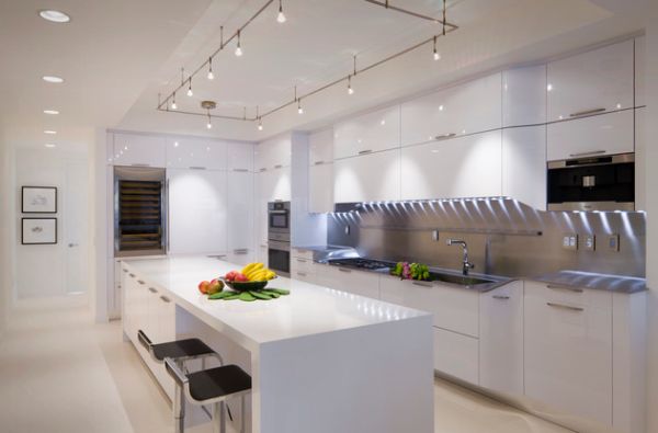 Cool track lighting installation above the kitchen island is a perfect choice