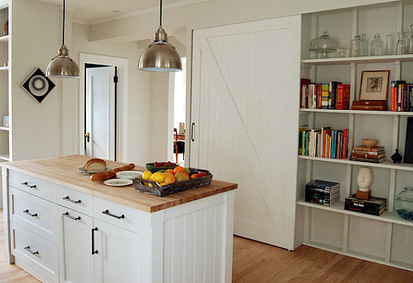 Decorative items on shelving in an eclectic kitchen